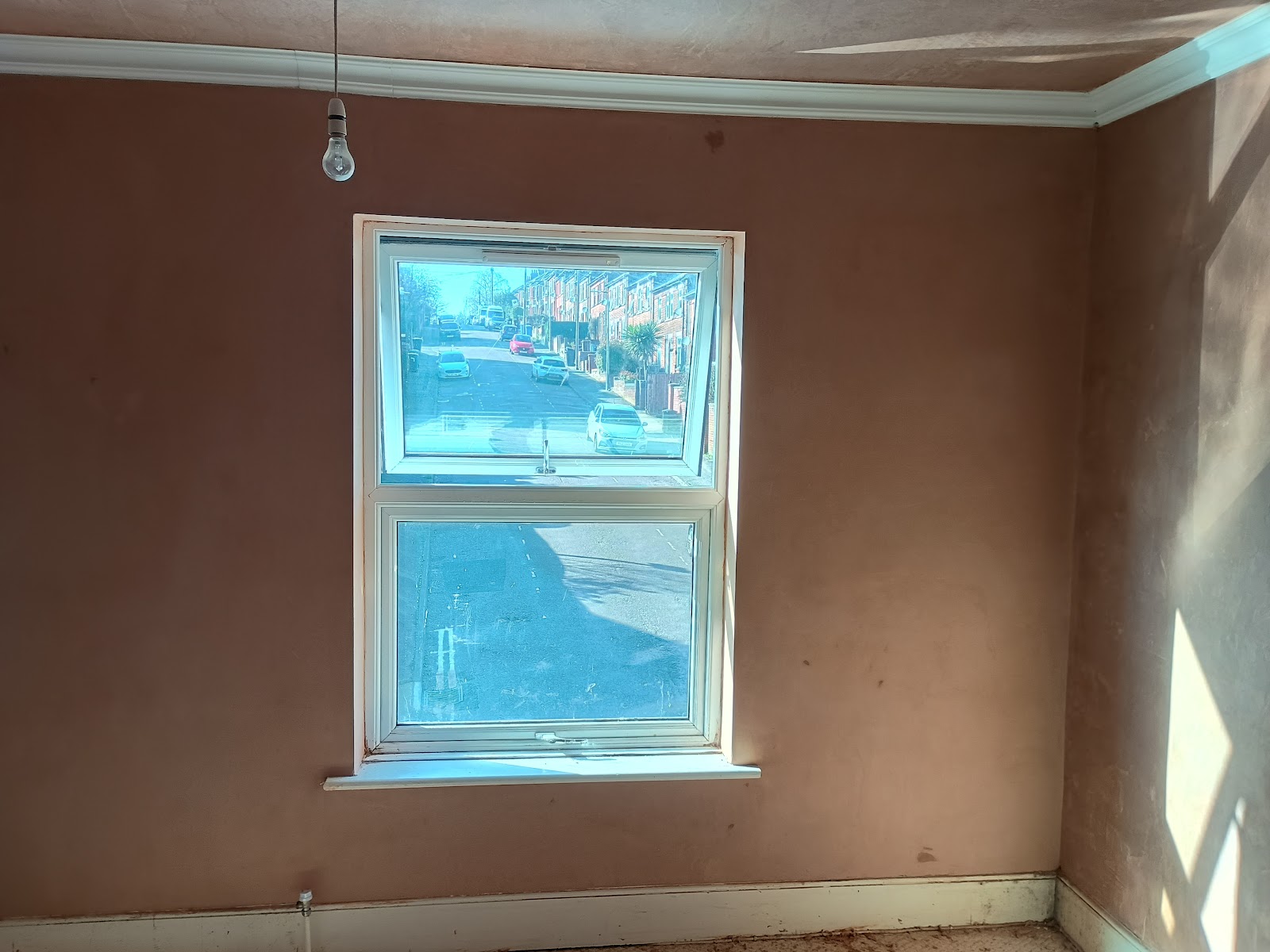 A room replastered with new coving, finished by Paul Bridges